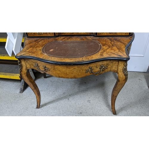 197 - A 19th century French Louis XV style, burr walnut, ebonised and marquetry bonheur-du-jour, with a mi... 
