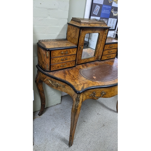 197 - A 19th century French Louis XV style, burr walnut, ebonised and marquetry bonheur-du-jour, with a mi... 