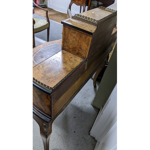 197 - A 19th century French Louis XV style, burr walnut, ebonised and marquetry bonheur-du-jour, with a mi... 