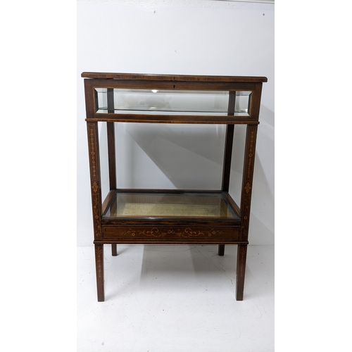 199 - An Edwardian marquetry inlaid mahogany bijouterie display table, of rectangular form with bevelled g... 
