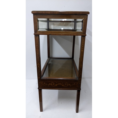 199 - An Edwardian marquetry inlaid mahogany bijouterie display table, of rectangular form with bevelled g... 