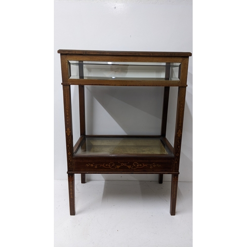199 - An Edwardian marquetry inlaid mahogany bijouterie display table, of rectangular form with bevelled g... 