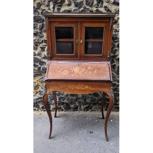 200 - A Late 19th century French marquetry and gilt metal mounted kingwood secretaire / bonheur du jour, w... 