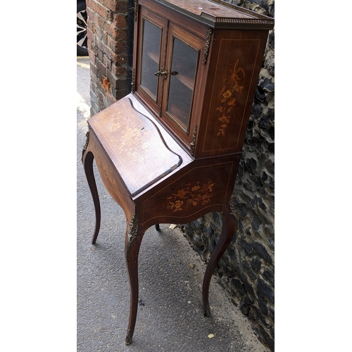 200 - A Late 19th century French marquetry and gilt metal mounted kingwood secretaire / bonheur du jour, w... 