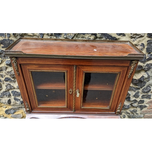 200 - A Late 19th century French marquetry and gilt metal mounted kingwood secretaire / bonheur du jour, w... 