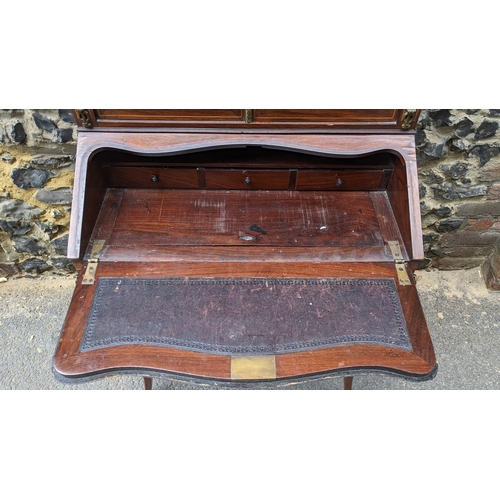 200 - A Late 19th century French marquetry and gilt metal mounted kingwood secretaire / bonheur du jour, w... 