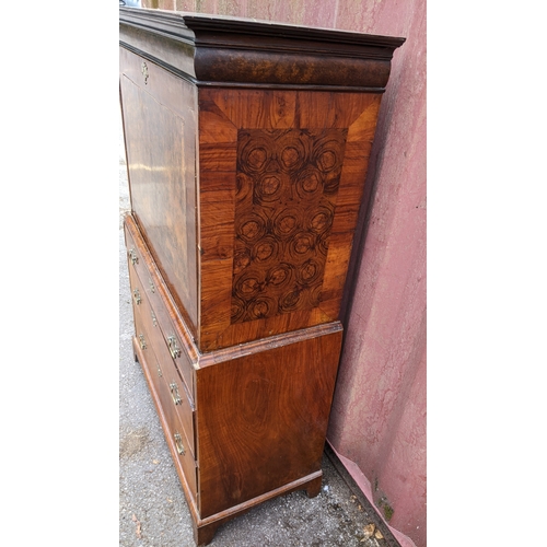 201 - An 18th century and later walnut crossbanded escritoire, having a moulded cornice and fall flap abov... 