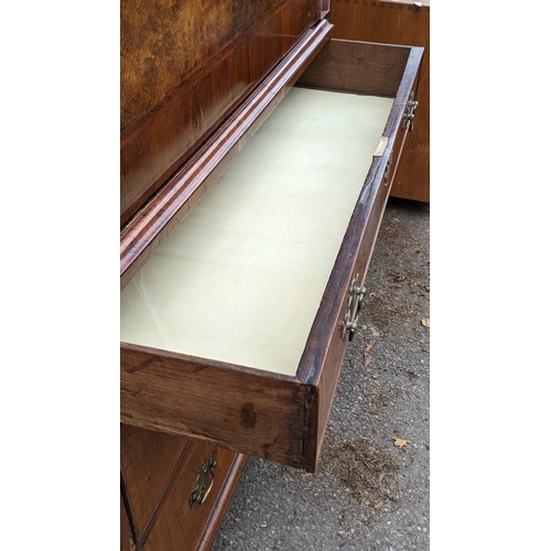 201 - An 18th century and later walnut crossbanded escritoire, having a moulded cornice and fall flap abov... 