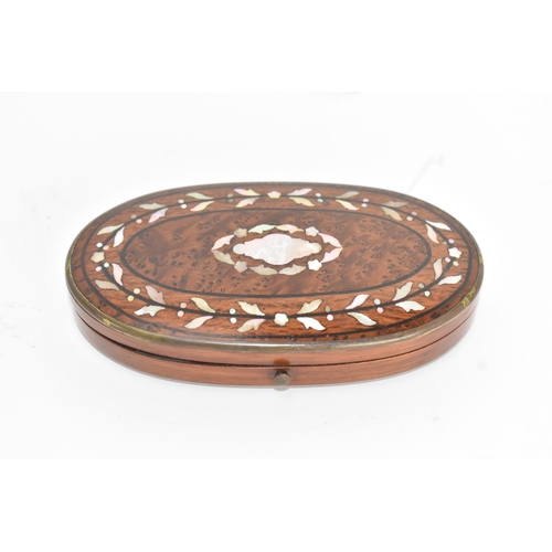 204 - A 19th century gilt metal sewing etui, the scissors cast with floral scroll handles, all housed in a... 