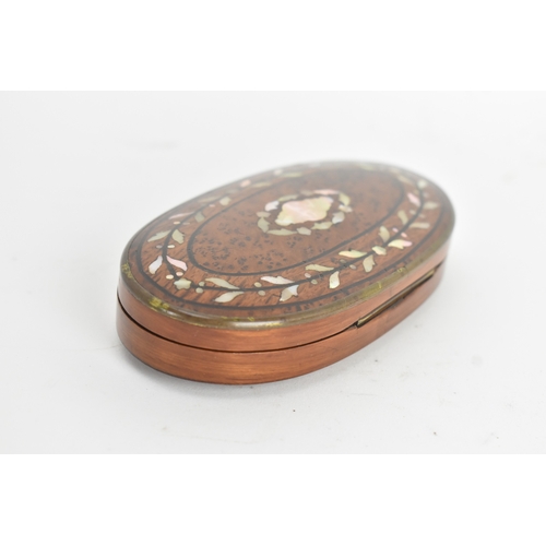 204 - A 19th century gilt metal sewing etui, the scissors cast with floral scroll handles, all housed in a... 