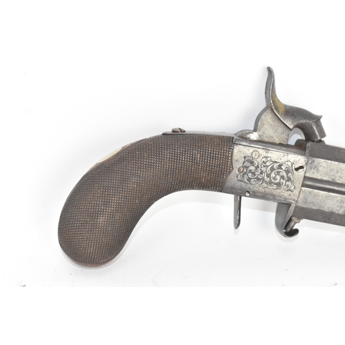 205 - A 19th century English double-barrel pistol, the action engraved with foliate scrollwork and fitted ... 