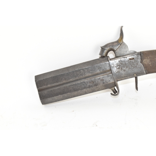 205 - A 19th century English double-barrel pistol, the action engraved with foliate scrollwork and fitted ... 