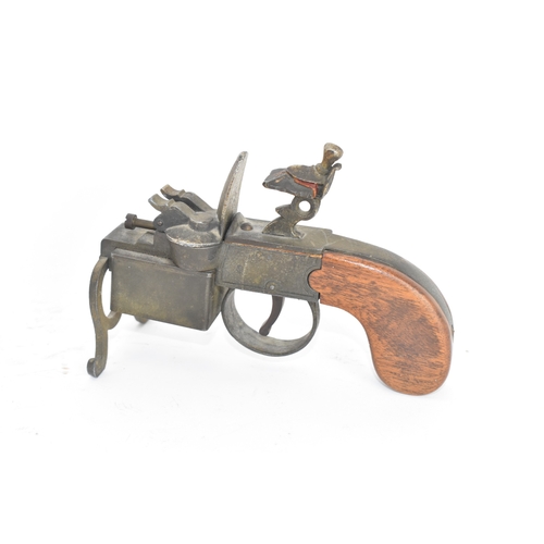 206 - A Dunhill novelty lighter in the form of a flintlock tinderbox, with wooden grips, dummy hammer and ... 