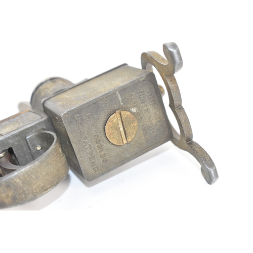 206 - A Dunhill novelty lighter in the form of a flintlock tinderbox, with wooden grips, dummy hammer and ... 