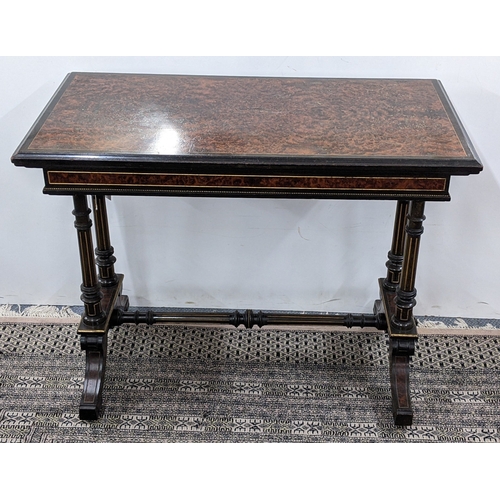 209 - A Gillows Victorian Aesthetic Movement ebonised and amboyna games table, the rectangular hinged top ... 