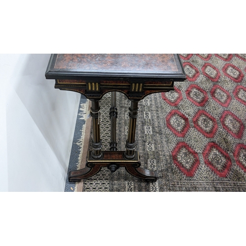 209 - A Gillows Victorian Aesthetic Movement ebonised and amboyna games table, the rectangular hinged top ... 