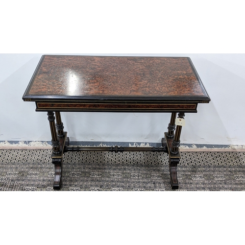 209 - A Gillows Victorian Aesthetic Movement ebonised and amboyna games table, the rectangular hinged top ... 