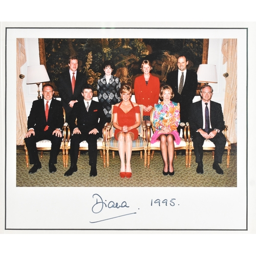 210 - A signed colour group photograph featuring Diana, Princess of Wales seated centrally, with eight oth... 