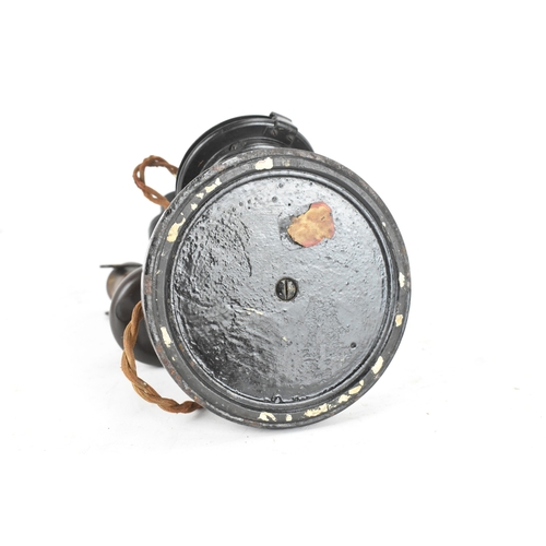 211 - An early 20th century candlestick telephone, model No.150, black lacquered metal and brass, rotary d... 