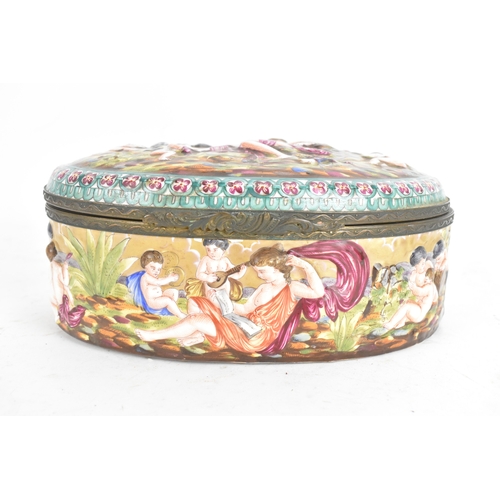 212 - A late 19th/early 20th century Capodimonte porcelain and metal-mounted oval casket, the domed lid an... 