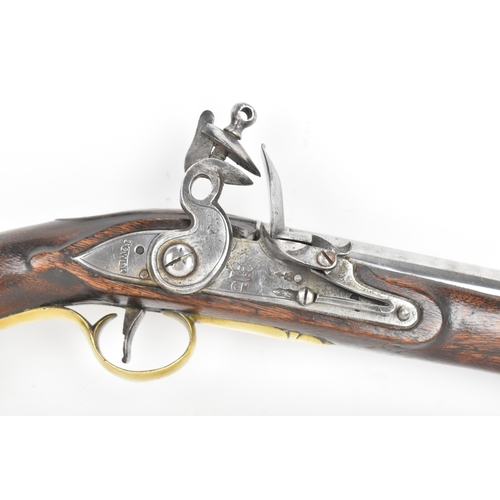 213 - A reproduction of a British Tower flintlock pistol, in the style of the early 19th century Sea Servi... 