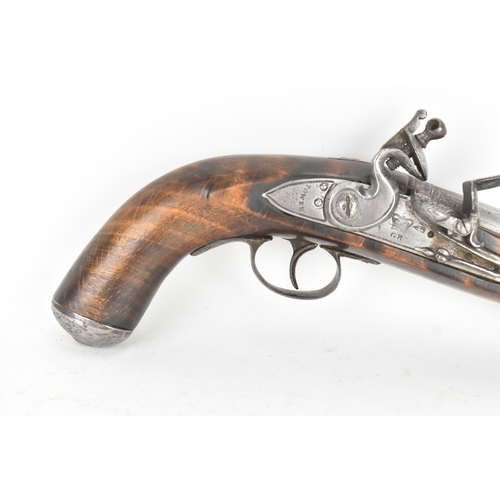 214 - A reproduction of a British Tower flintlock pistol, in the style of the early 19th century Sea Servi... 