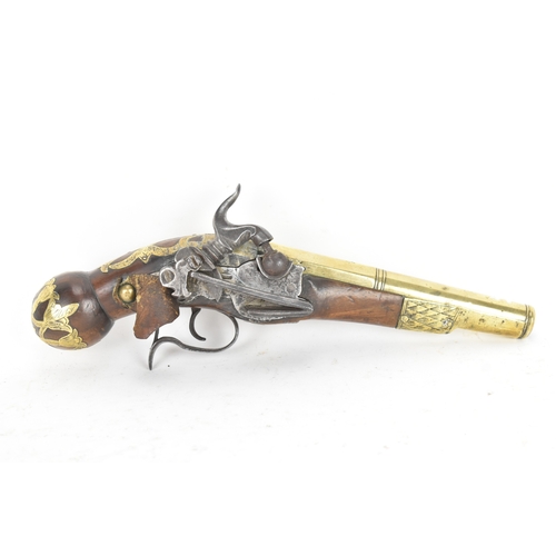 215 - A late 18th/early 19th century Balkan or Ottoman flintlock pistol, with a brass barrel engraved with... 