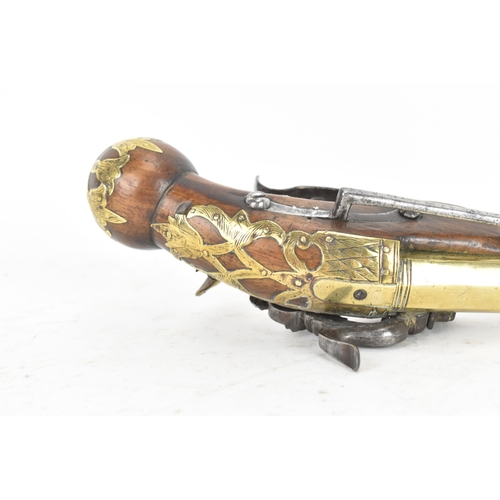 215 - A late 18th/early 19th century Balkan or Ottoman flintlock pistol, with a brass barrel engraved with... 