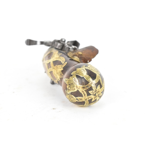 215 - A late 18th/early 19th century Balkan or Ottoman flintlock pistol, with a brass barrel engraved with... 