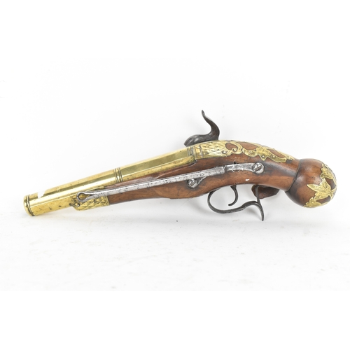 215 - A late 18th/early 19th century Balkan or Ottoman flintlock pistol, with a brass barrel engraved with... 