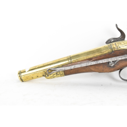 215 - A late 18th/early 19th century Balkan or Ottoman flintlock pistol, with a brass barrel engraved with... 