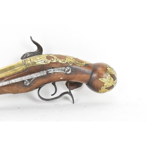 215 - A late 18th/early 19th century Balkan or Ottoman flintlock pistol, with a brass barrel engraved with... 