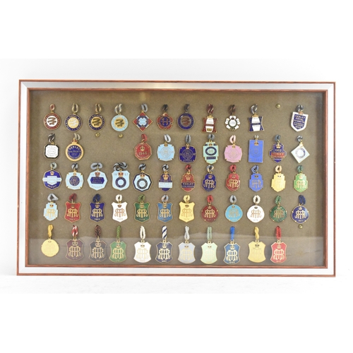 222 - A collection of fifty-six Henley Regatta enamelled badges, dating from 1924-33, 1935-37, 1946-88, ho... 