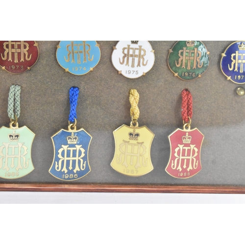 222 - A collection of fifty-six Henley Regatta enamelled badges, dating from 1924-33, 1935-37, 1946-88, ho... 