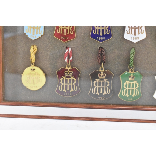 222 - A collection of fifty-six Henley Regatta enamelled badges, dating from 1924-33, 1935-37, 1946-88, ho... 