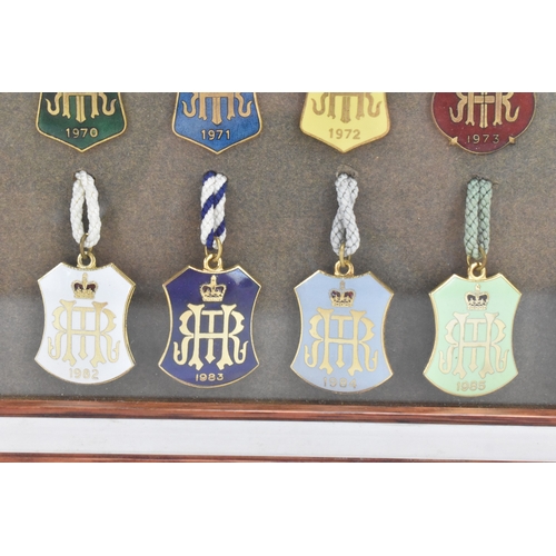 222 - A collection of fifty-six Henley Regatta enamelled badges, dating from 1924-33, 1935-37, 1946-88, ho... 