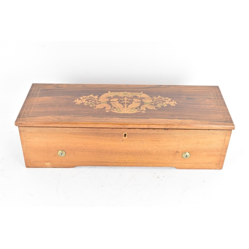 223 - A Victorian rosewood and walnut cased cylinder music box, the hinged rosewood veneered lid with foli... 