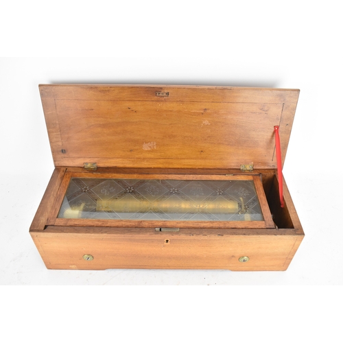 223 - A Victorian rosewood and walnut cased cylinder music box, the hinged rosewood veneered lid with foli... 