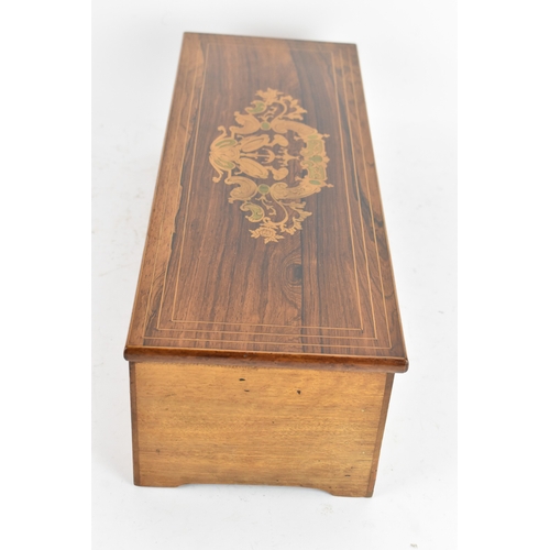 223 - A Victorian rosewood and walnut cased cylinder music box, the hinged rosewood veneered lid with foli... 