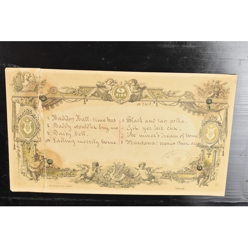 224 - A Victorian ebonized cylinder music box, the rectangular case with line inlay and central motif, enc... 