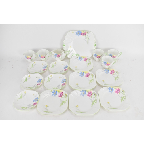 70 - An Art Deco Shelley 'Anemone' pattern bone china tea set, pattern no. 12067, comprising a milk jug, ... 