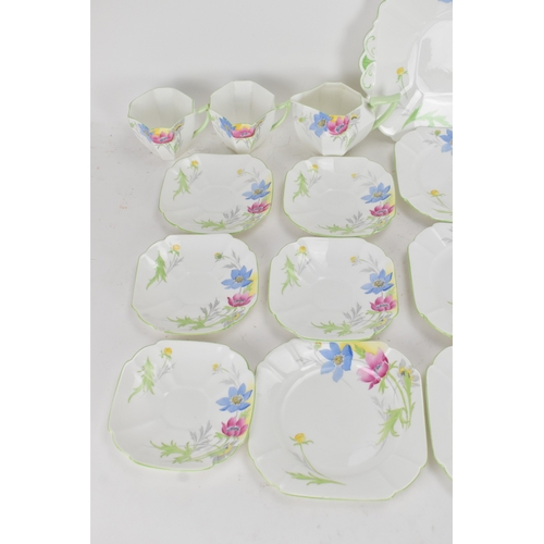 70 - An Art Deco Shelley 'Anemone' pattern bone china tea set, pattern no. 12067, comprising a milk jug, ... 