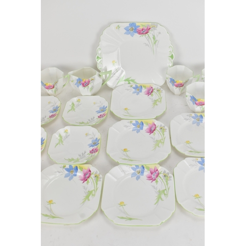 70 - An Art Deco Shelley 'Anemone' pattern bone china tea set, pattern no. 12067, comprising a milk jug, ... 