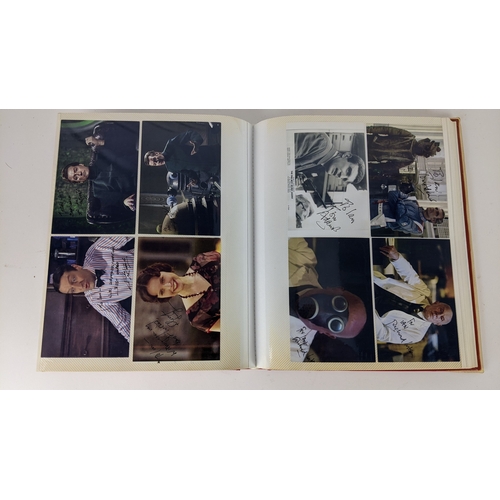 80 - A Doctor Who album of autographs on photos, signed by several cast members to include Richard Briers... 
