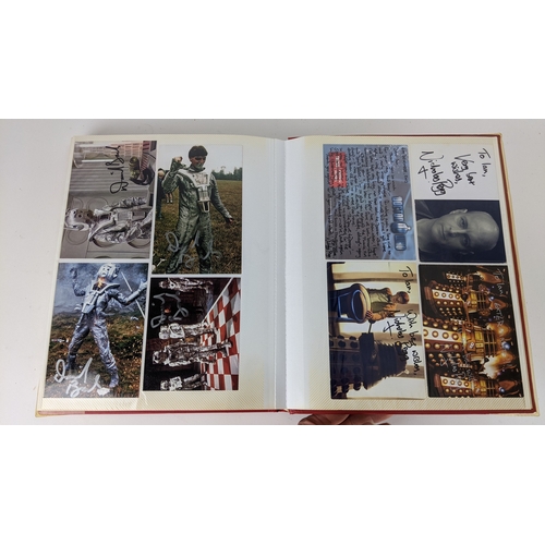 80 - A Doctor Who album of autographs on photos, signed by several cast members to include Richard Briers... 