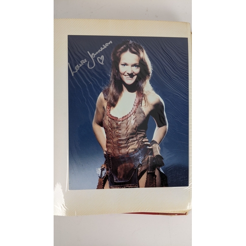 83 - A Doctor Who album of autographs on photos, signed by several cast members to include Louise Jameson... 
