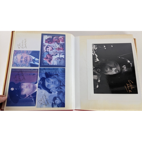 83 - A Doctor Who album of autographs on photos, signed by several cast members to include Louise Jameson... 