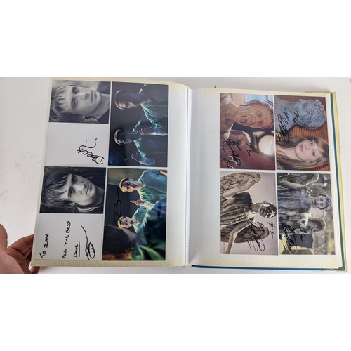 84 - A Doctor Who album of autographs on photos, signed by several cast members to include David Bradley,... 