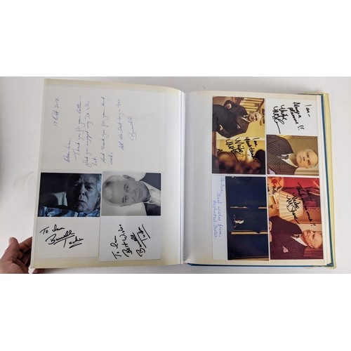 84 - A Doctor Who album of autographs on photos, signed by several cast members to include David Bradley,... 