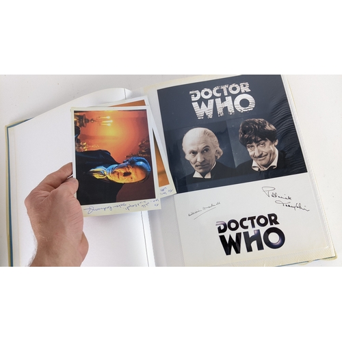 84 - A Doctor Who album of autographs on photos, signed by several cast members to include David Bradley,... 